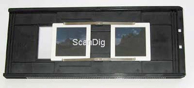 The slide mount holder FH-869M for mounted medium formats with two inserted 6x6 slides